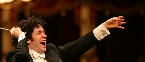 conductor leading an orchestra