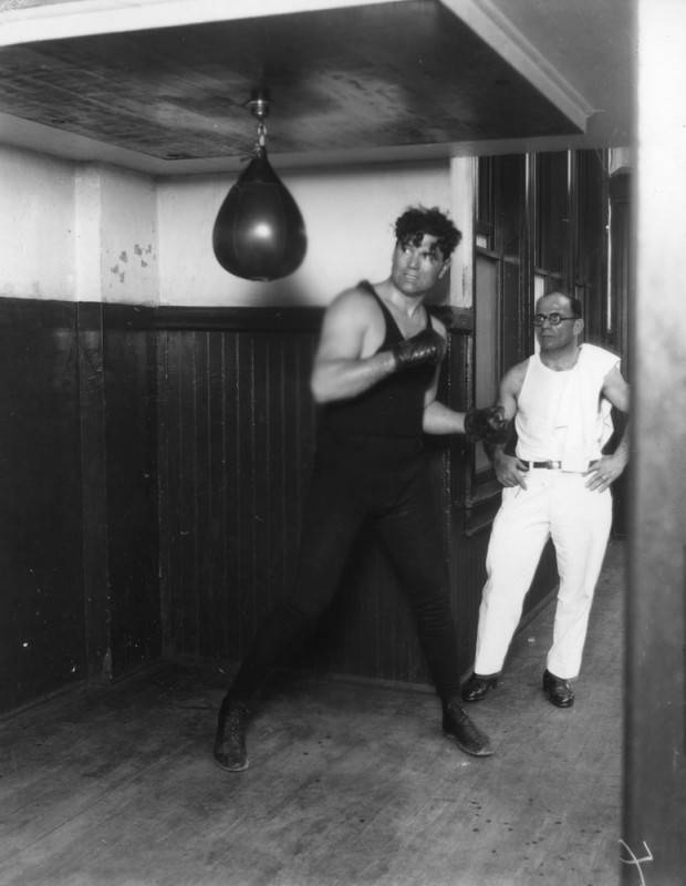 Jack Dempsey punches the speed bag