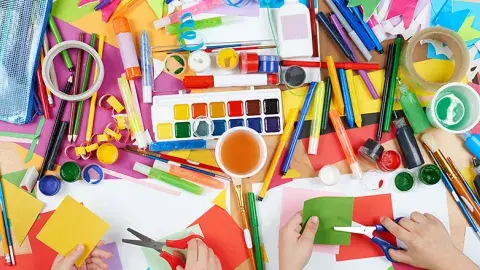 Table filled with art supplies